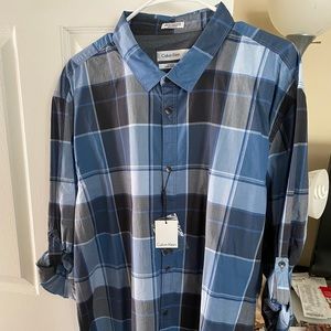 New Calvin Klein Long Sleeves Shirt. Blue color.